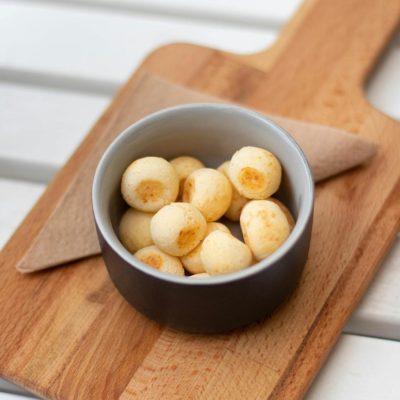 Baked Breads on Round Black and White Ceramic Bowl on the Top of Brown Chopping Board
